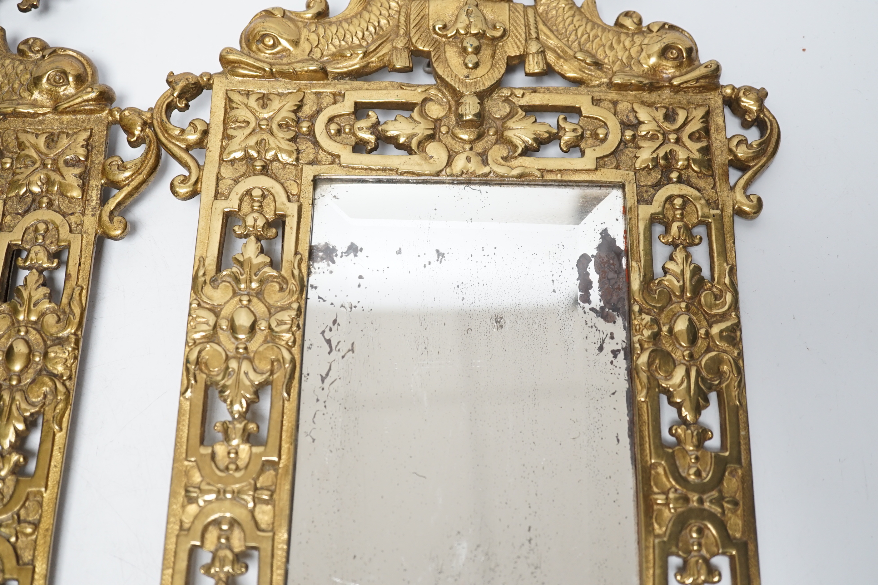 A pair of period-style mirrored brass girandoles, 61cm high